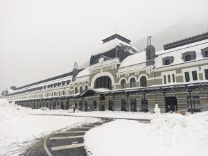 The old Canfranc International train station, on a snowy day.