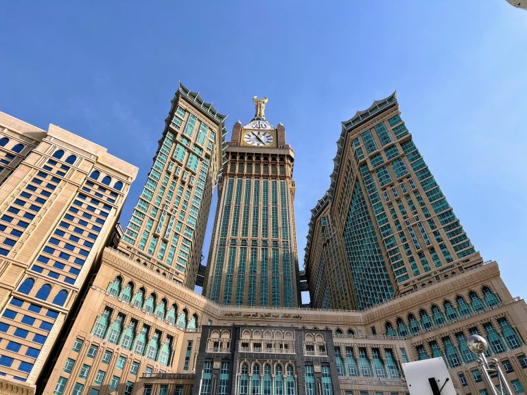 Clock tower in macca showing 5 minutes to 5 in the clock.