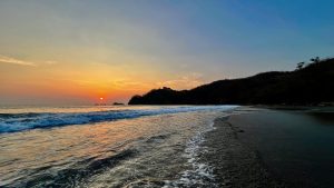 Colorful sunset at Sugar Beach, Costa Rica.