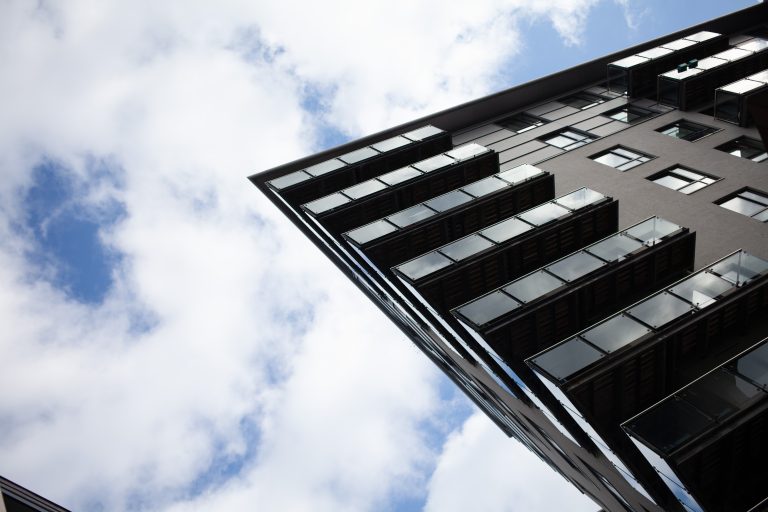 Sharp angular building on a blue sky background.