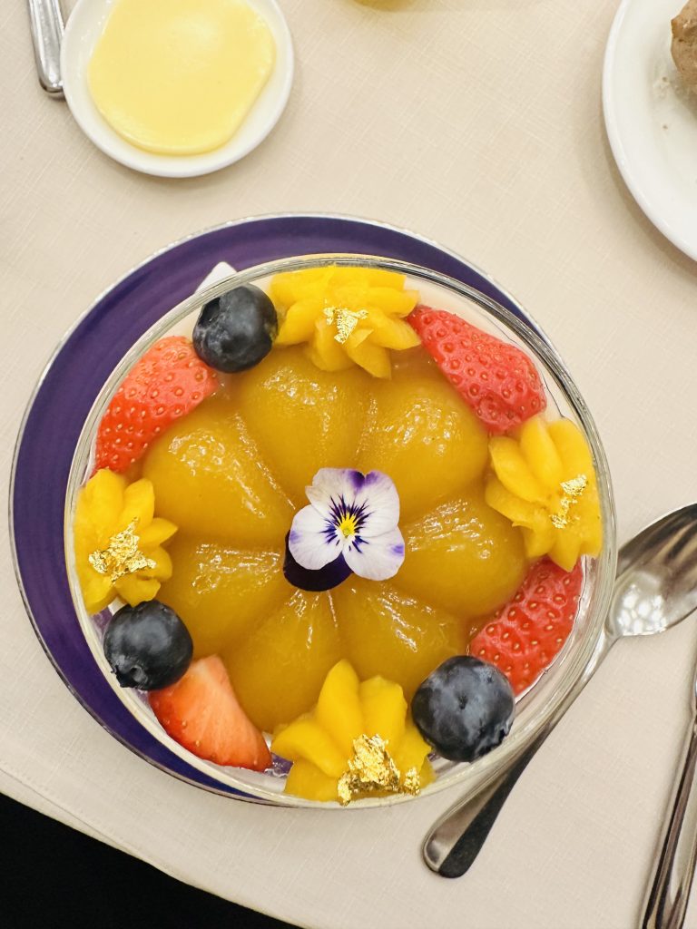 Properly decorated food in small glass bowl in a restaurant of Taipei.