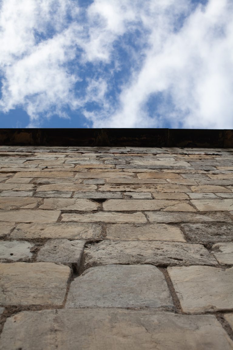 Old wall with blue sky