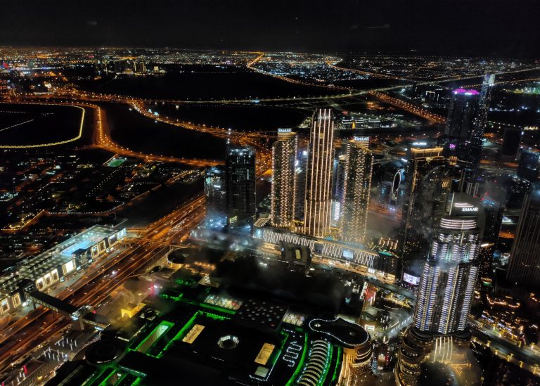 Glimmering Dubai: A Spectacular Night View from the 124th Floor