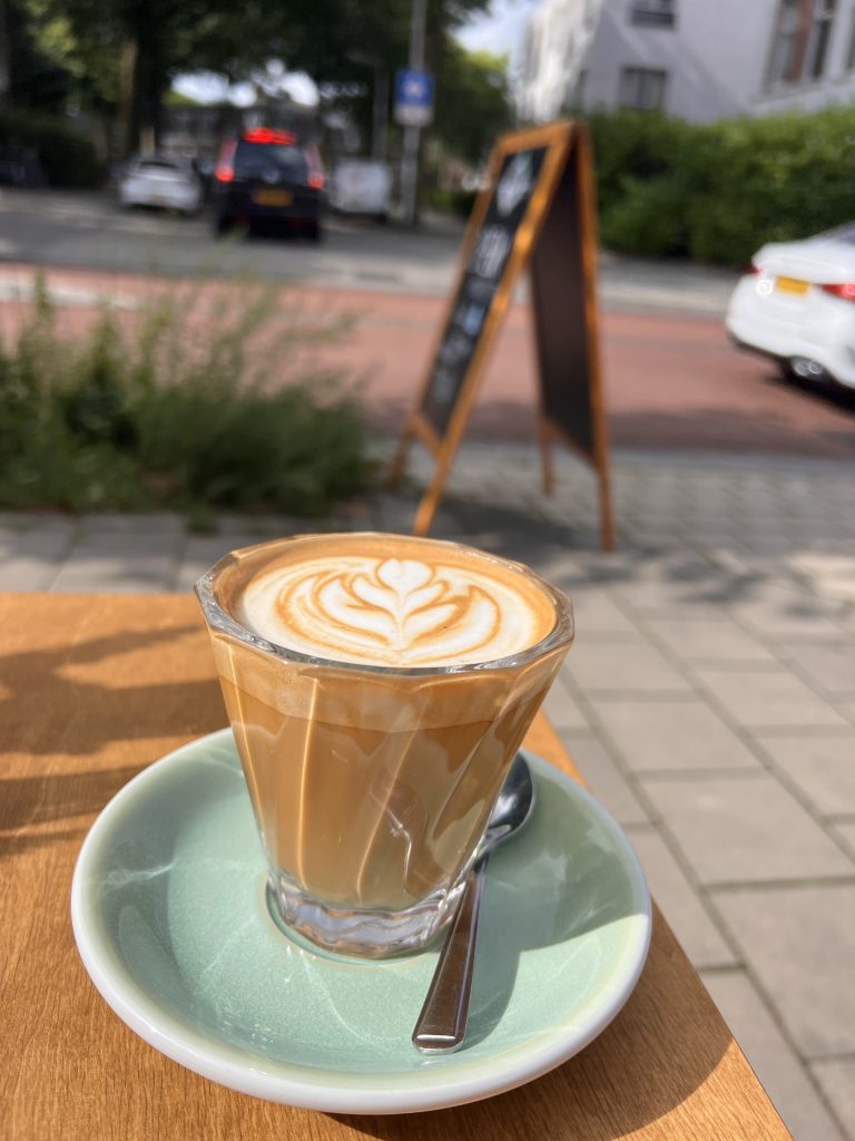 coffee on saucer with spoon