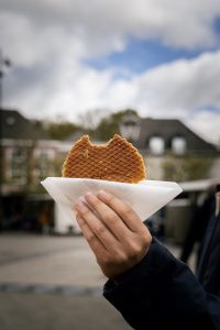 A typical Dutch streetfood, the "Stroopwafel". A waffle made from two thin, round layers of baked batter with a sweet caramel-like syrup filling in between