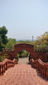 Stairs going down towards entrance gate of a temple