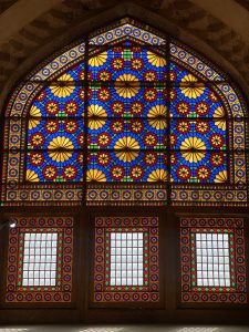 Stained glass windows in the Divankhaneh mansion located in Shiraz near KarimKhan Zand Citadel inside the 2nd hall in front of fireplace.
