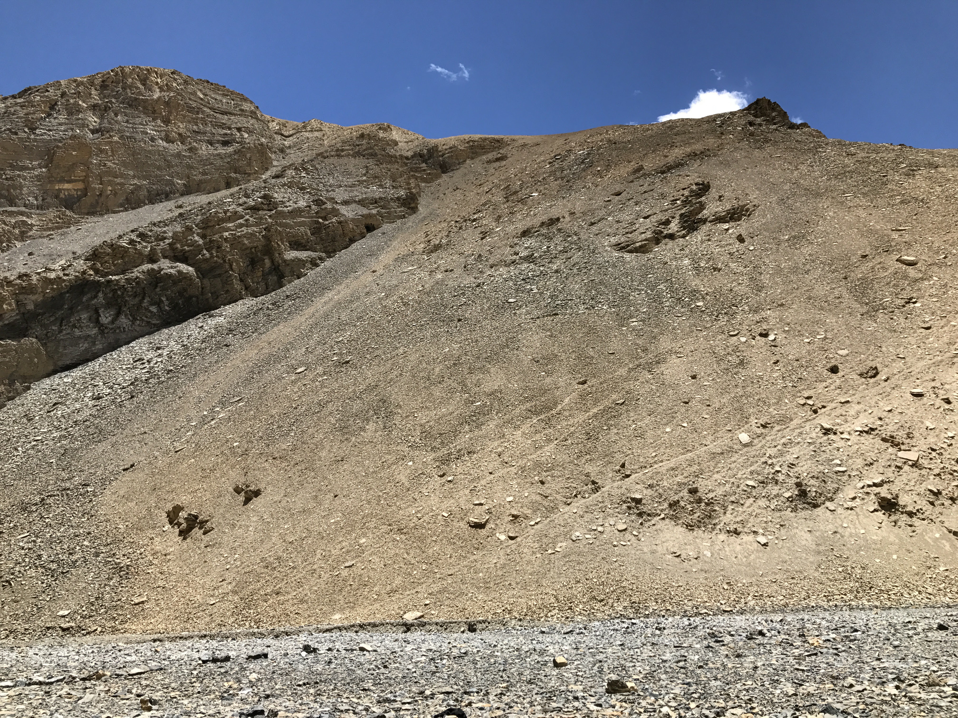 Upper Mustang. Beige sand mountain in contrast with clear sky