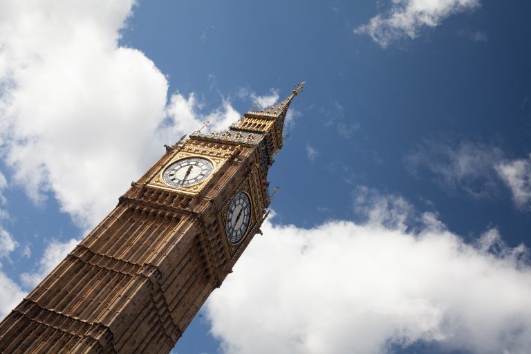 Big Ben against a blue cloudy sky