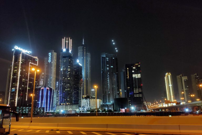 Dubai’s dazzling cityscape at night, ablaze with illuminated buildings.