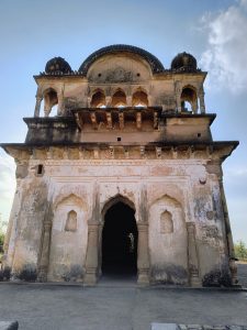 An ancient architectural structure with a domed roof and intricate carvings, inviting visitors to explore its historical significance and grandeur.