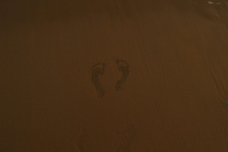 Two footprints on Beach