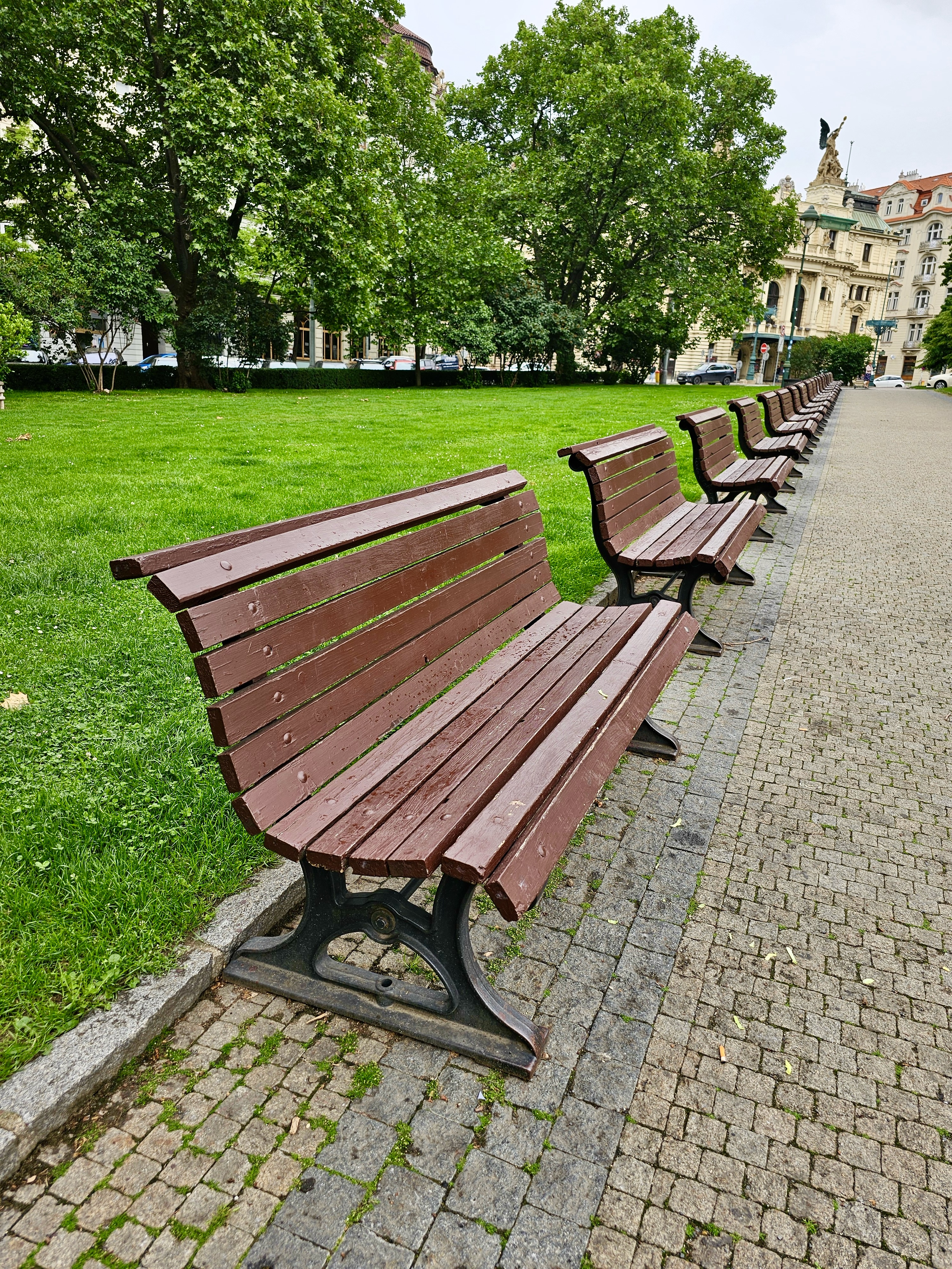 Benches of Basilica of St. Ludmila garden. From Prague, Czech Republic.