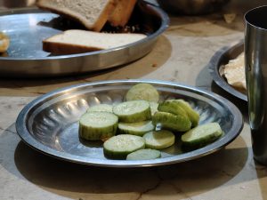 View larger photo: Chopped cucumber in steel plate.