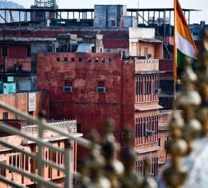 View larger photo: Aerial view of Jaipur with a flag of the Royal Family in the front