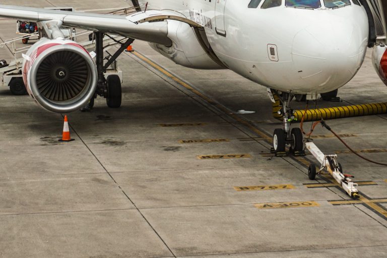 Commercial airplane parked at the airport