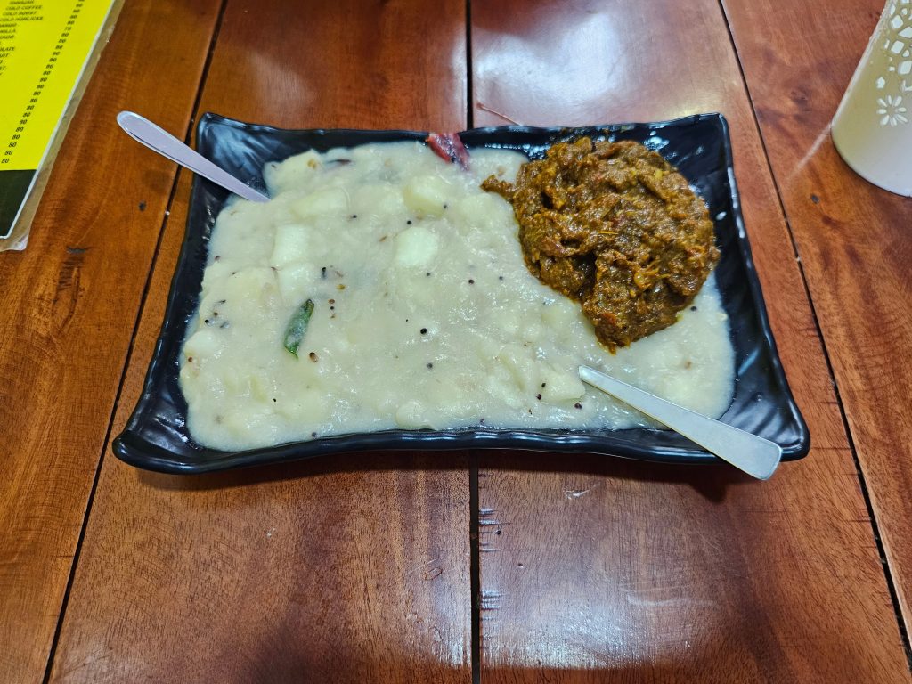 Authentic Kerala cuisine: Paal Kappa and Beef. Tapioca in coconut milk with spices, paired with savory beef curry.