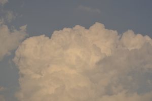 View larger photo: Clouds expanding and covering the sky