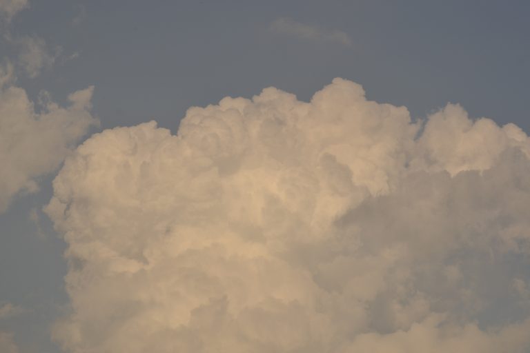 Clouds expanding and covering the sky