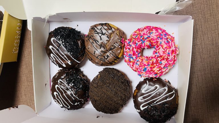 Donuts and cookies in a box