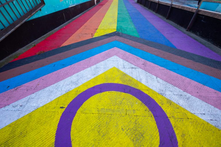 Intersex variant of the Progress Pride Flag painted on a city street