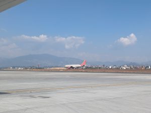 Long view of a flight in Tribhuvan International Airport, Nepal.