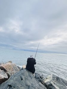  A man fishing at Cottesloe Beach, Perth, WA.
