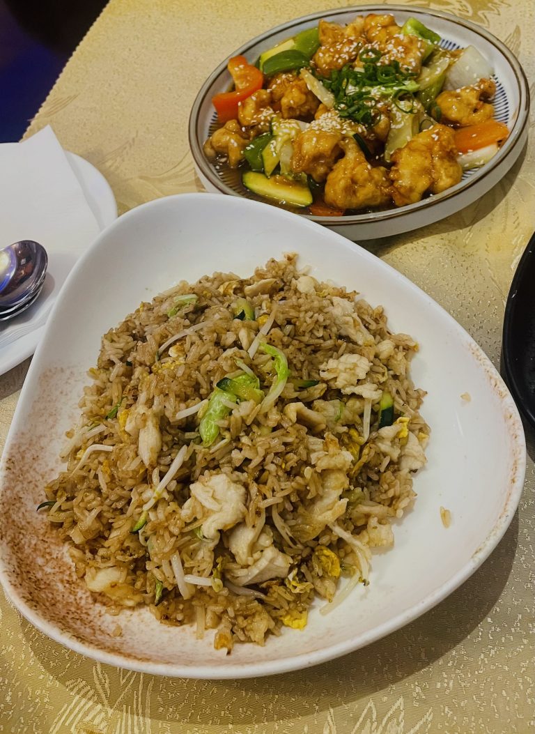 Chinese-style fried rice and chicken curry.