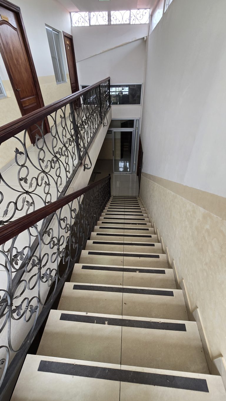 Looking down a stairwell indoors.