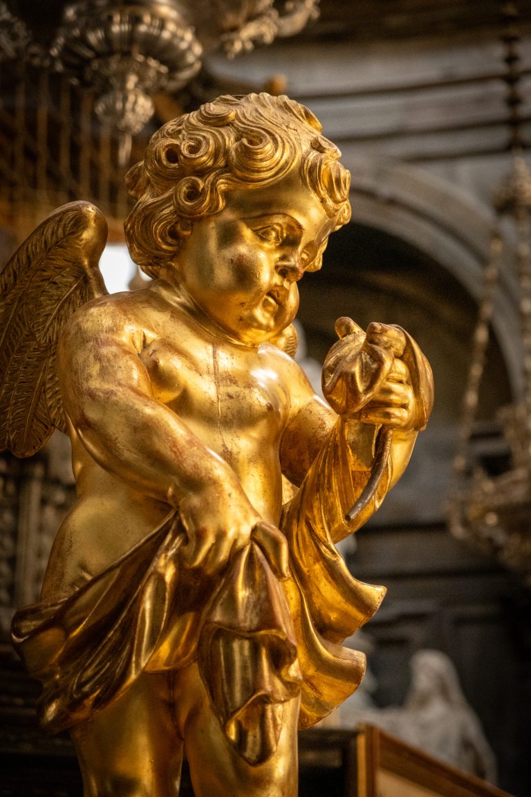 A golden angel statue at the Chapel of the Holy Shroud in Turin, Italy.