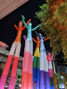 Inflatable air dancers with different colors of love.