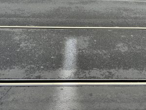 City trolley tracks embedded in the street.