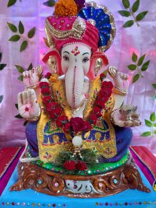 Lord Ganesha, brightly colored idol.