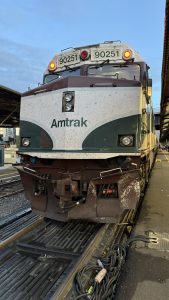 View larger photo: A front view of an Amtrak train numbered 90251 halted at Portland Amtrak Station.