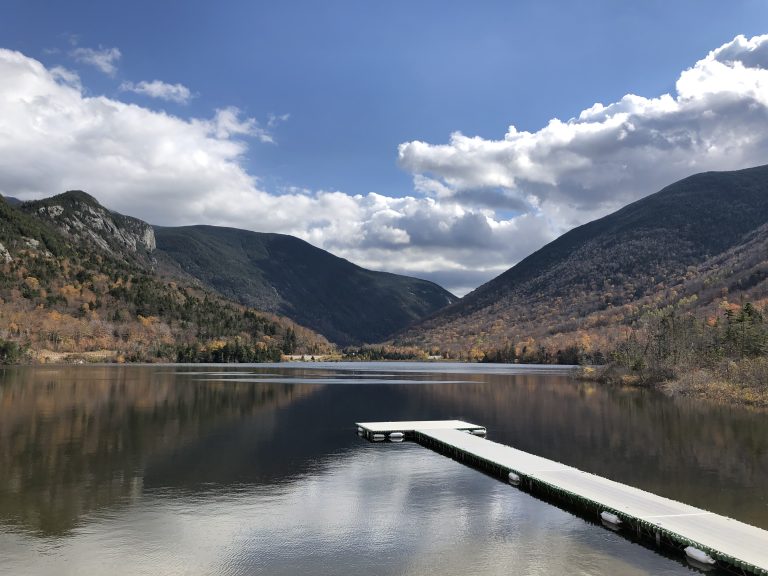 A long dock extends into Echo Lake in the White Mountains of New Hampshire.