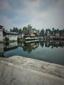 A view from the pond at the Tali Shiva Temple in Kozhikode city, Kerala, India. The temple is also known as the Tali Mahakshetram, and was built in the 14th Century.