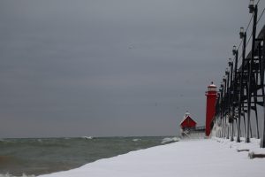 Snowy light house tower in grand haven michigan