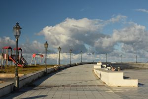 The square of anchors on Calderà beach, detail with a series of street lamps in the late afternoon of January. City of Barcellona Pozzo di gotto, Messina, Sicily.