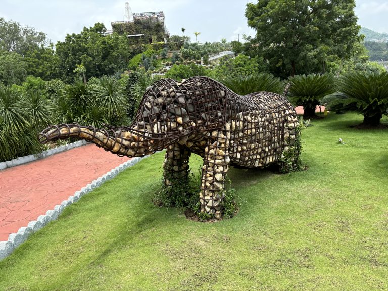 Rock elephant sculpture with intricate details and natural textures.