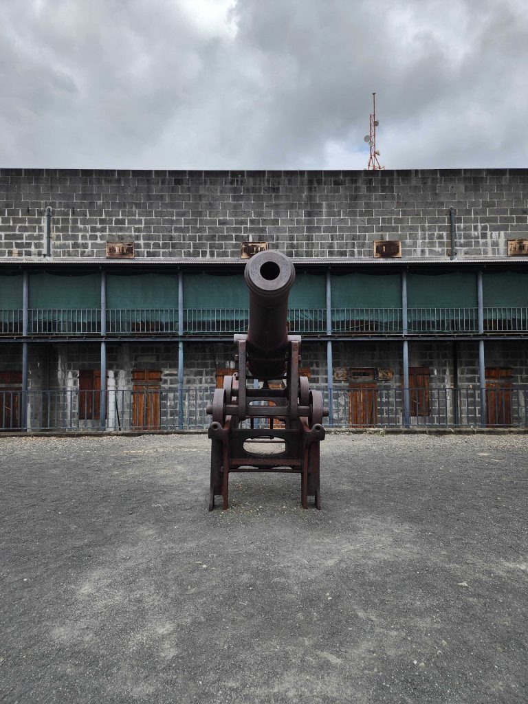 Lone Rusted Canon in the middle of the fort.