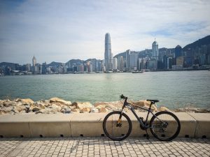 Bicycle in West Kowloon boulevard where you can see the buildings