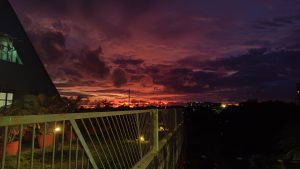 Night sky with red coloured clouds