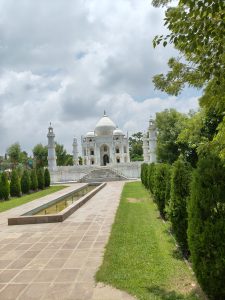 In this photo taken at Tirupati Rushivan Adventure Park, a miniature replica of the famous Taj Mahal is showcased. The stunning structure stands out as a unique attraction amidst the park's vast and exciting environment.