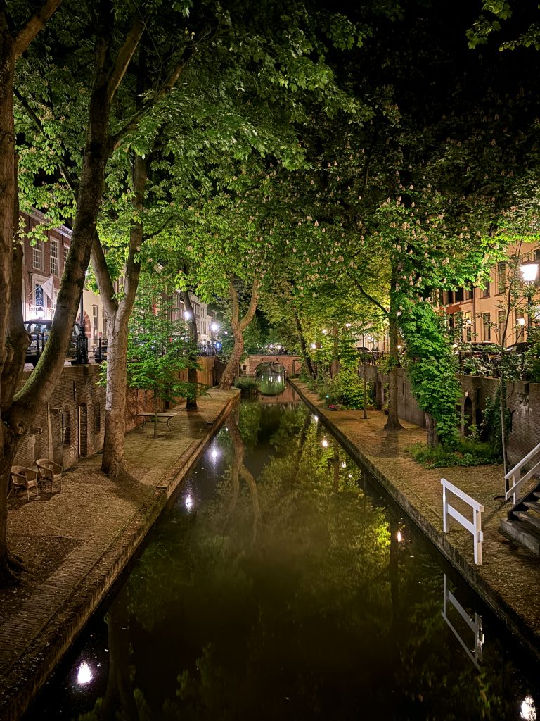 A view by night on the a canal in the city of Utrecht in the Netherlands.