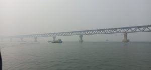 A place where fog, river, and bridge melt together at Mawa Ghat. 