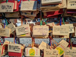 Wooden plaques for making wishes in a Japanese Temple
