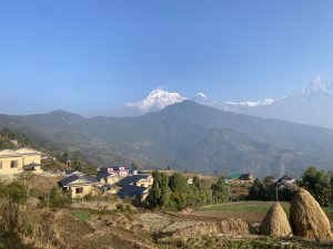 New Dhampus Village with mountain on background. 