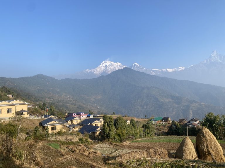 New Dhampus Village with mountain on background.