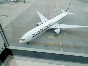 A Singapore Airlines aircraft taxiing in the Hong Kong International Airport from the view of Sky Bridge.