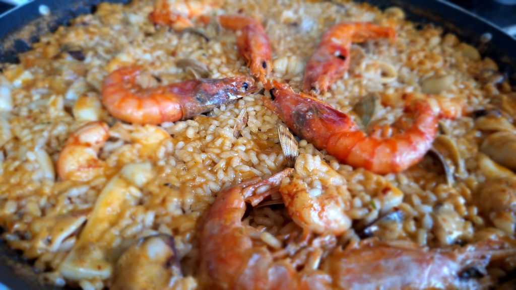 Paella, typical spanish food, mediterranean food.